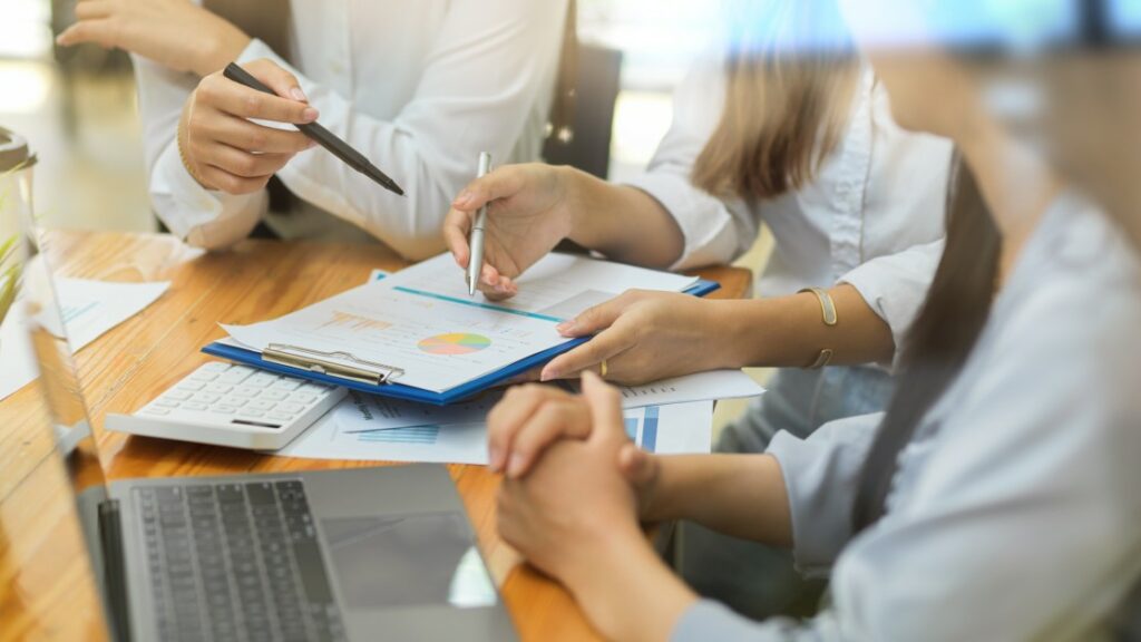 business team brainstorming at a desk