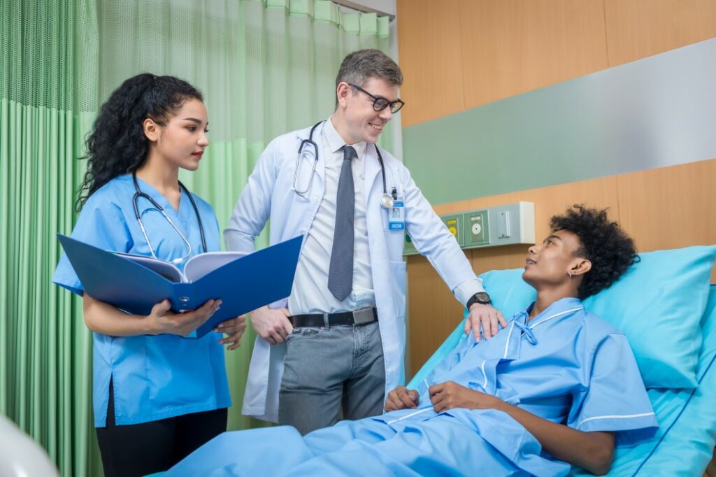 doctor and nurse taking care of a patient in the hospital