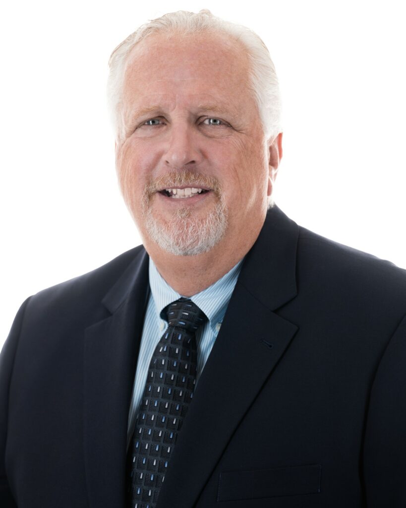 Man smiling in a suit